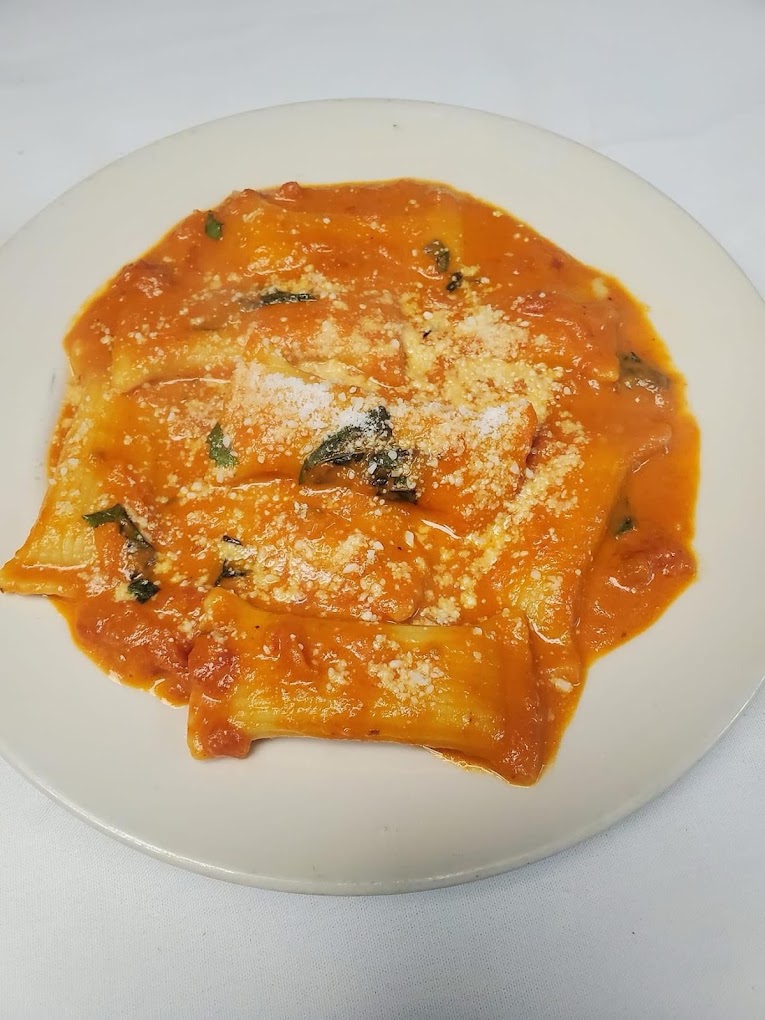 Ravioli in sauce at Delizia's Pizza